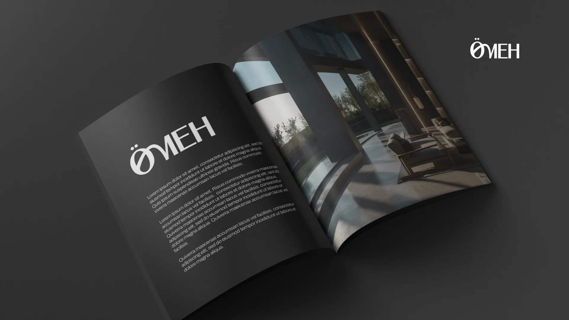 An open Ömeh brochure, with the logo in white on a black page